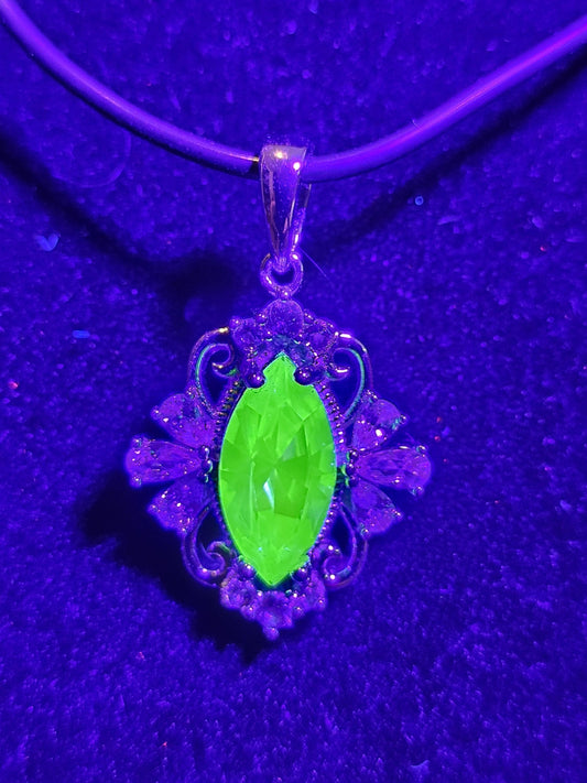 Uranium Glass Pendant in new Sterling Silver Fleur De Lis with a vintage 12x6 mm Marquise cut Uranium Glass that glows under black/UV light