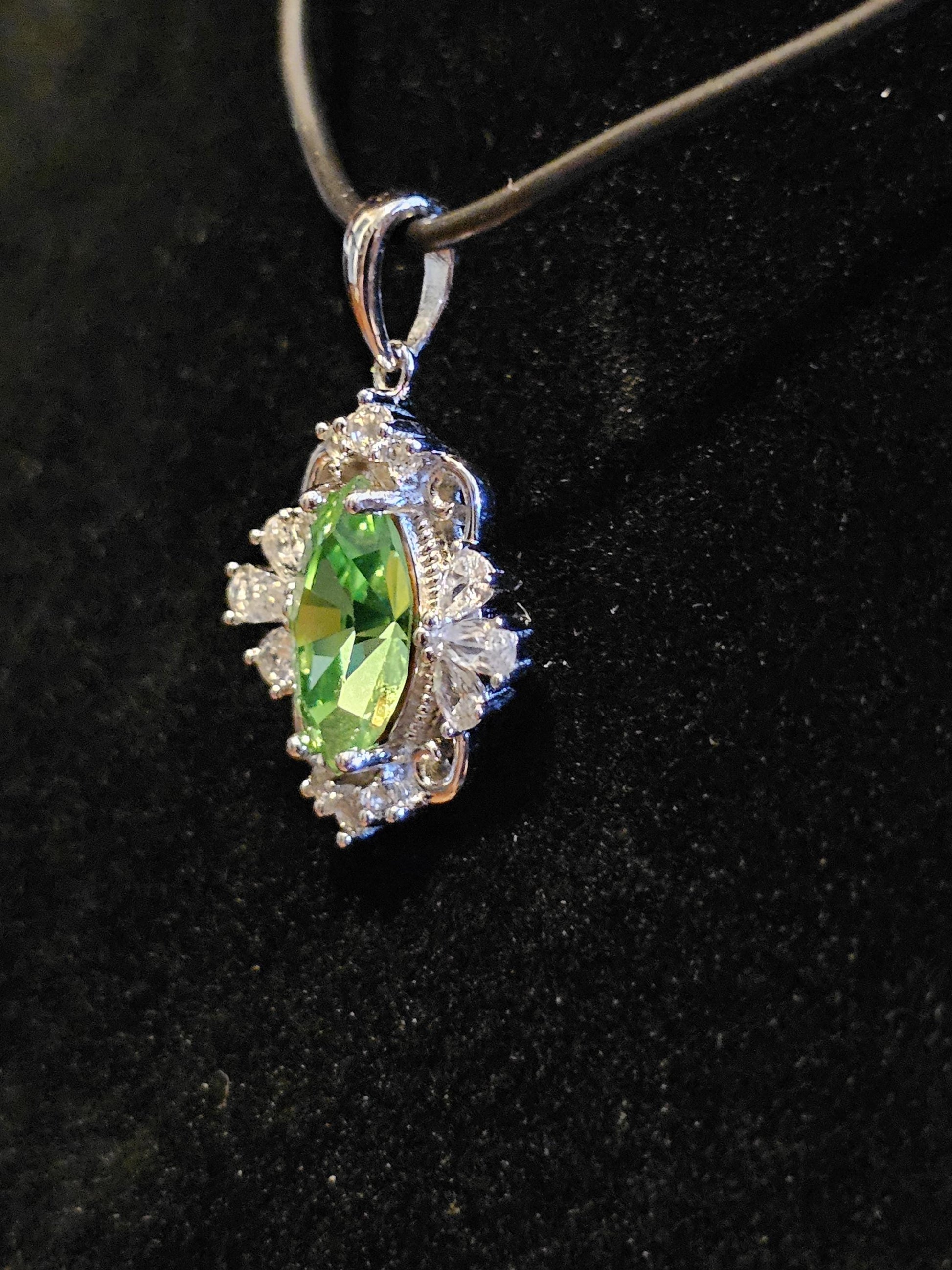 Uranium Glass Pendant in new Sterling Silver Fleur De Lis with a vintage 12x6 mm Marquise cut Uranium Glass that glows under black/UV light