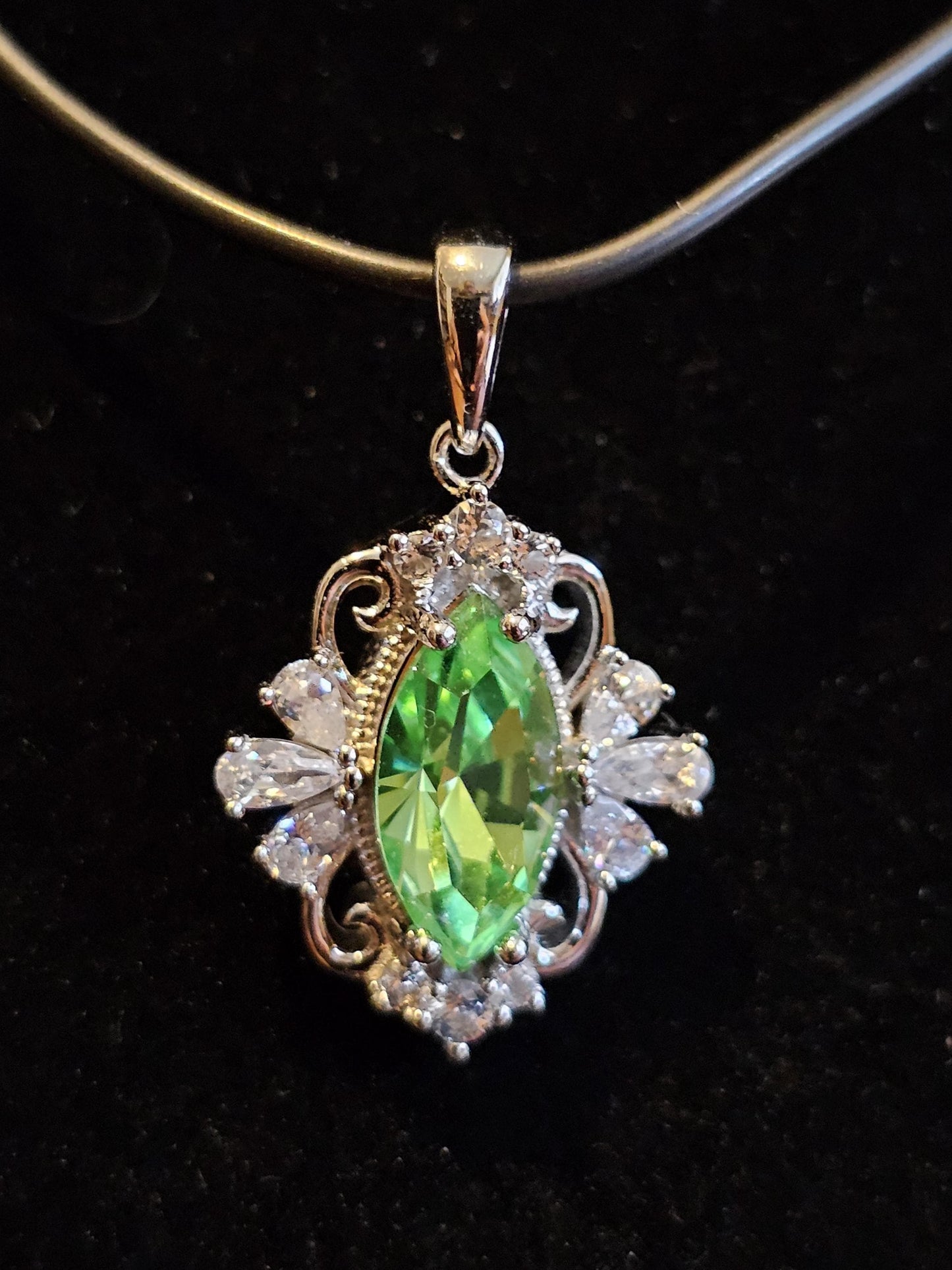 Uranium Glass Pendant in new Sterling Silver Fleur De Lis with a vintage 12x6 mm Marquise cut Uranium Glass that glows under black/UV light