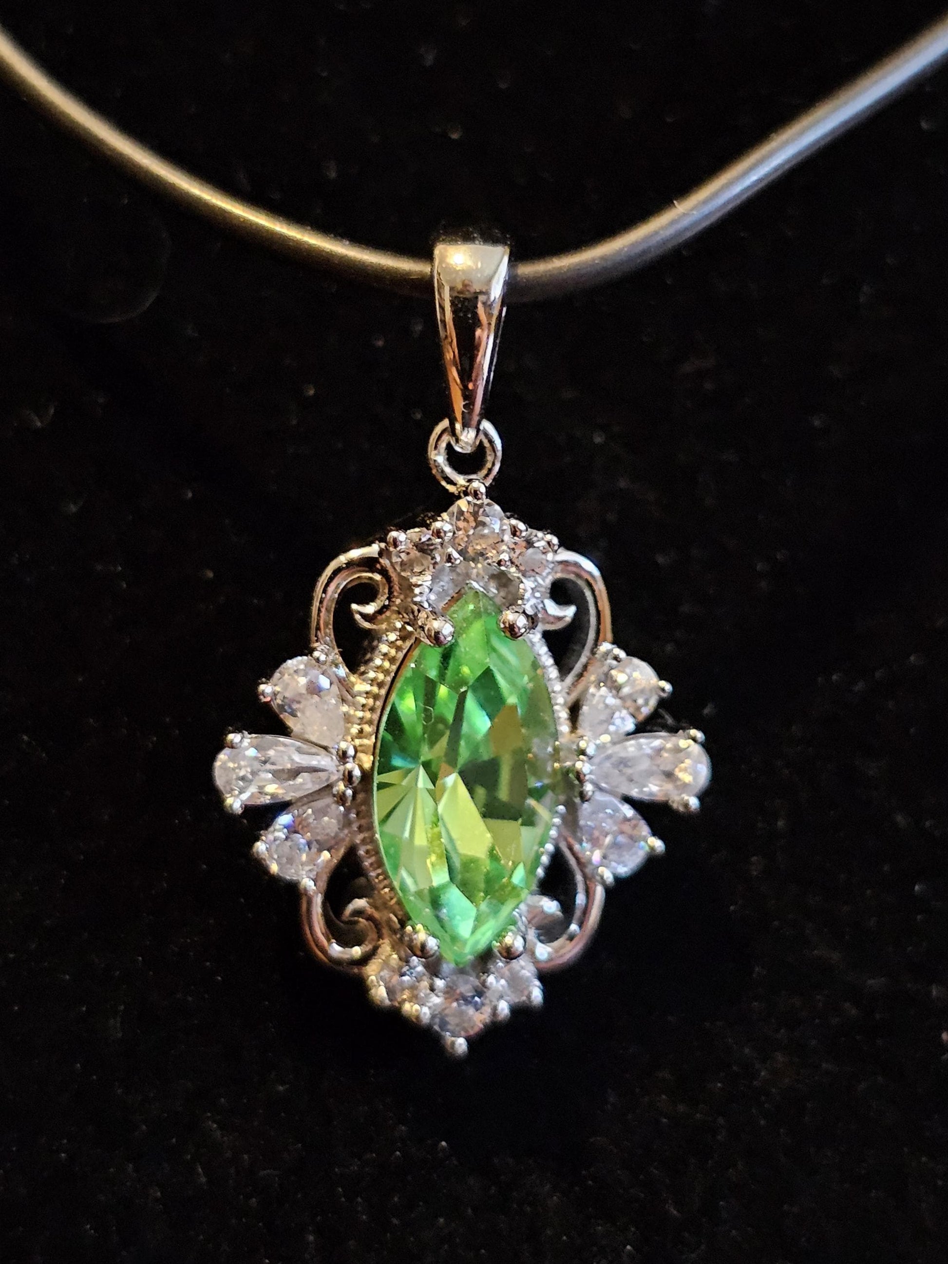 Uranium Glass Pendant in new Sterling Silver Fleur De Lis with a vintage 12x6 mm Marquise cut Uranium Glass that glows under black/UV light