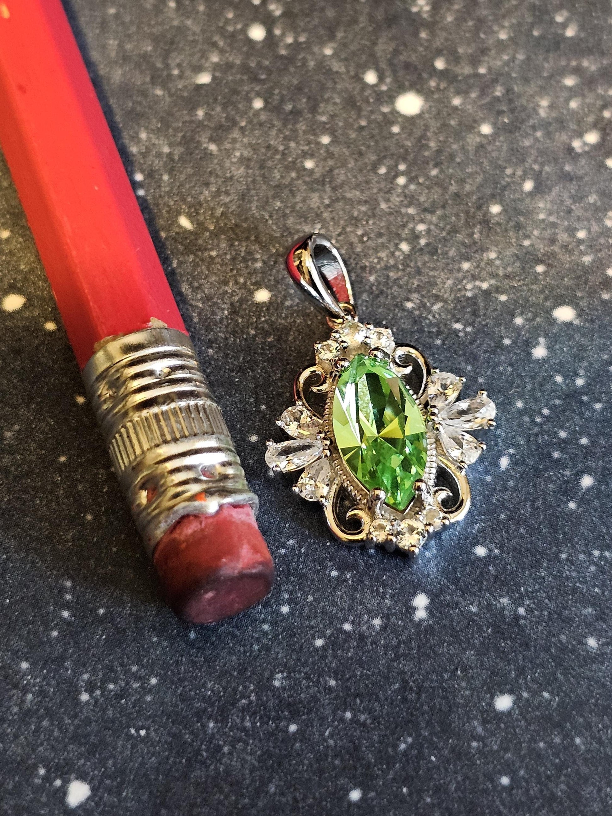 Uranium Glass Pendant in new Sterling Silver Fleur De Lis with a vintage 12x6 mm Marquise cut Uranium Glass that glows under black/UV light