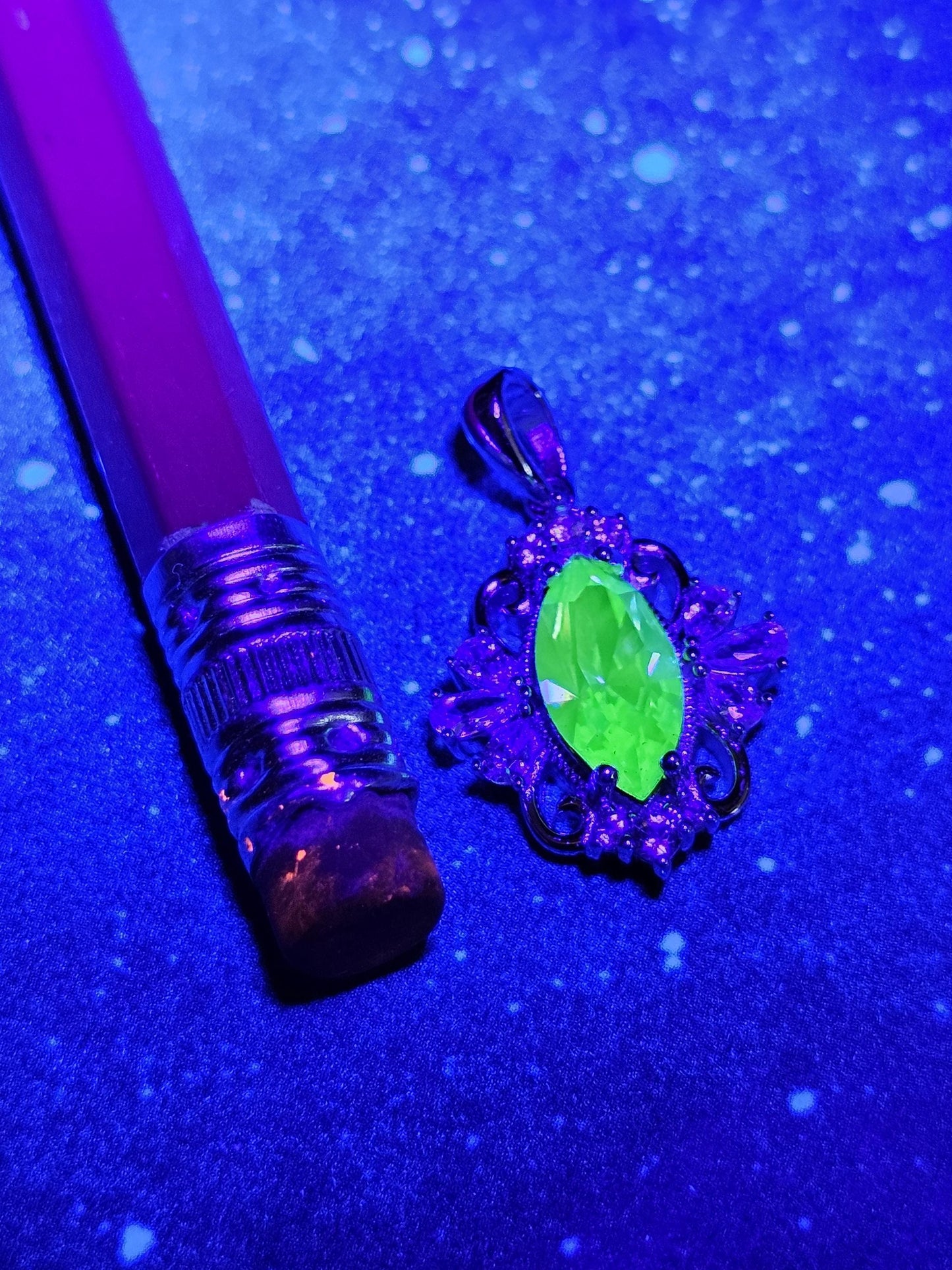 Uranium Glass Pendant in new Sterling Silver Fleur De Lis with a vintage 12x6 mm Marquise cut Uranium Glass that glows under black/UV light
