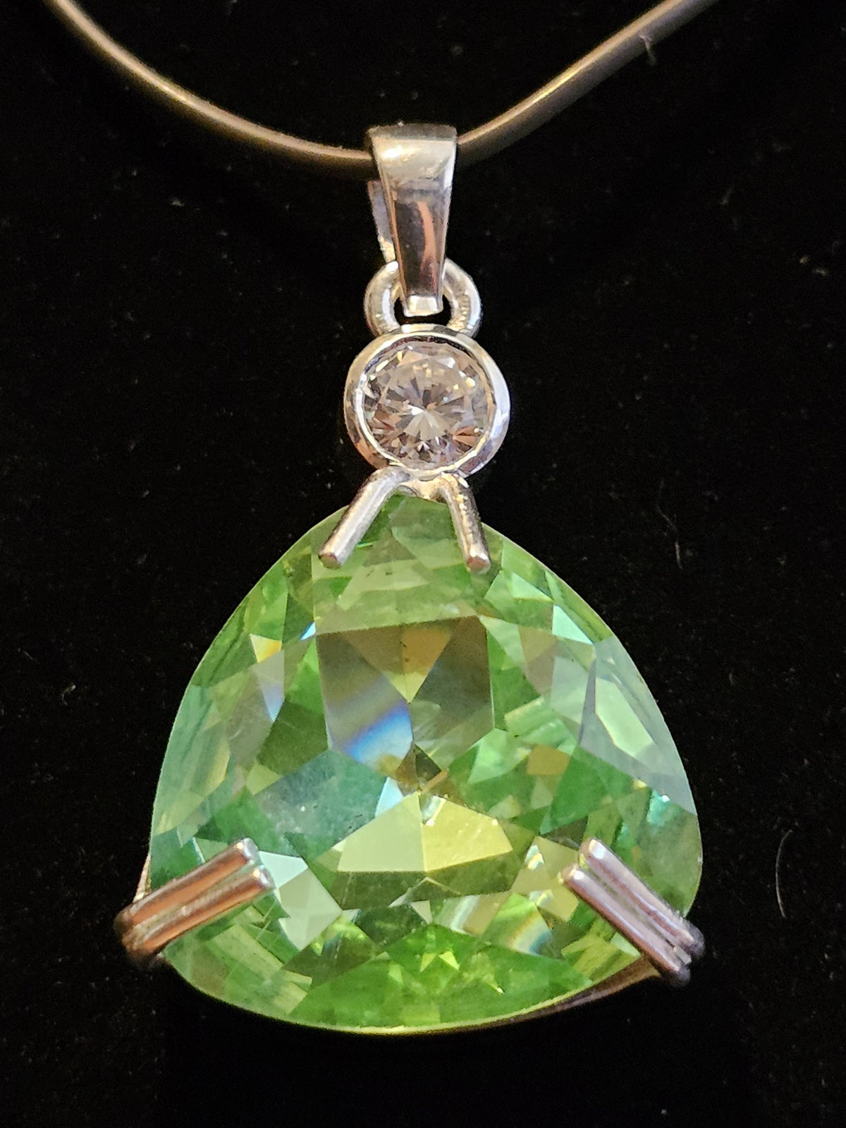 Uranium Glass Pendant in new Sterling Silver with a large 23 mm vintage Trillian cut Uranium Glass stone that glows under black / UV light
