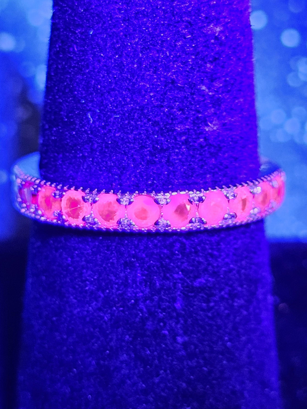 Natural Ruby Ring size 6, 7, 8, and 9 in New Sterling Silver Half Eternity style 2.5 mm Round cut stones that glow Pink under Black/UV light