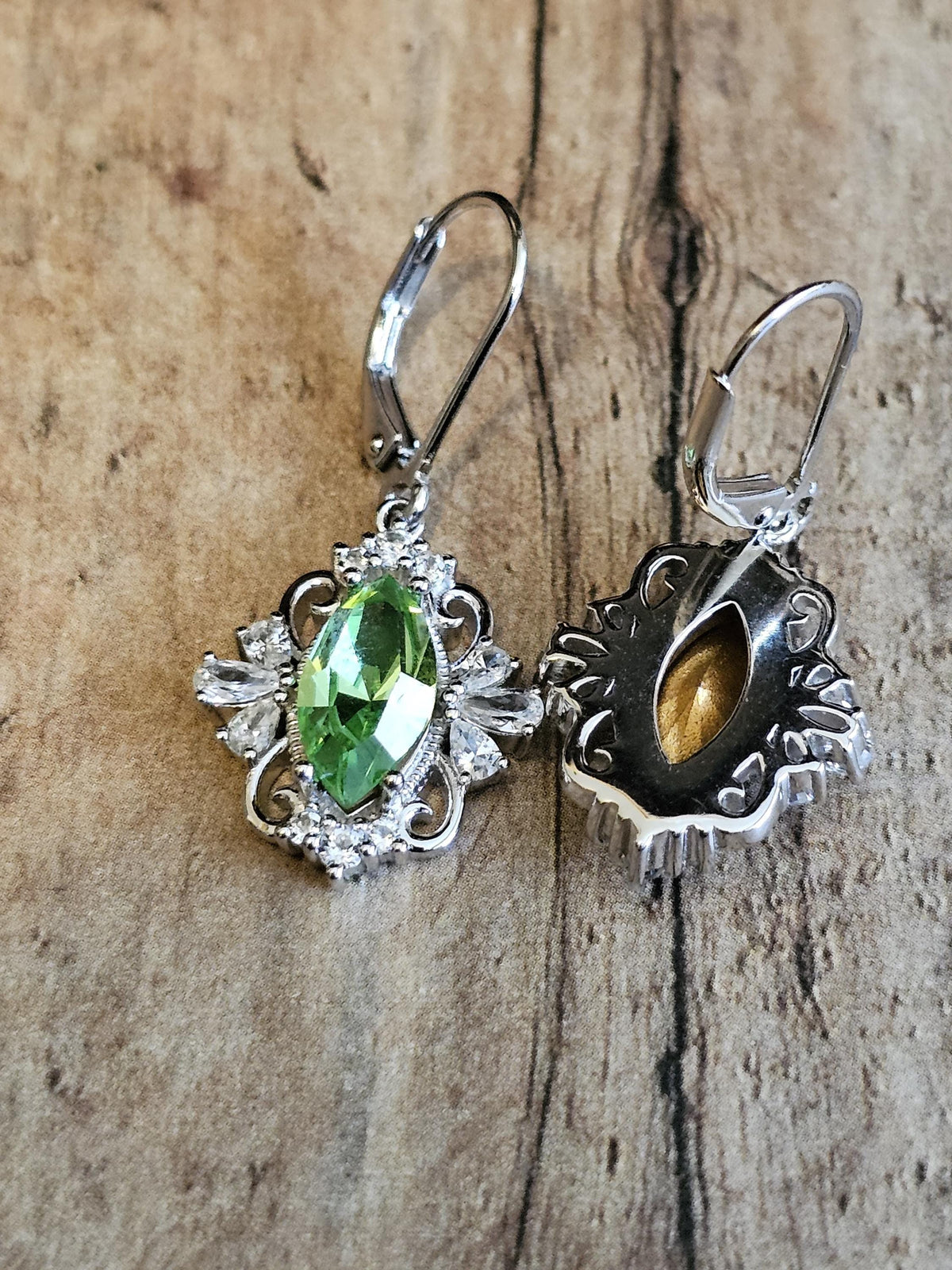 Uranium Glass Leverback Fleur De Lis Earrings Sterling Silver with Marquise cut 12x6 mm Uranium Glass stones, that glow under black/UV light
