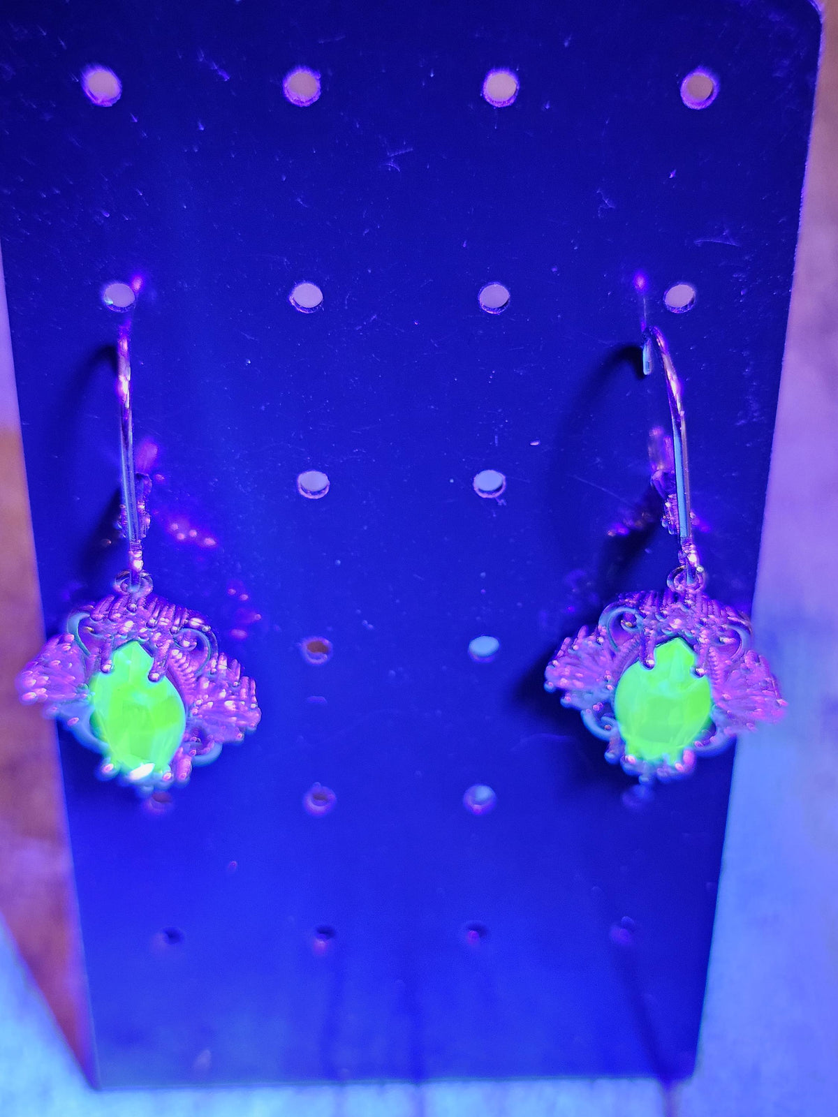 Uranium Glass Leverback Fleur De Lis Earrings Sterling Silver with Marquise cut 12x6 mm Uranium Glass stones, that glow under black/UV light