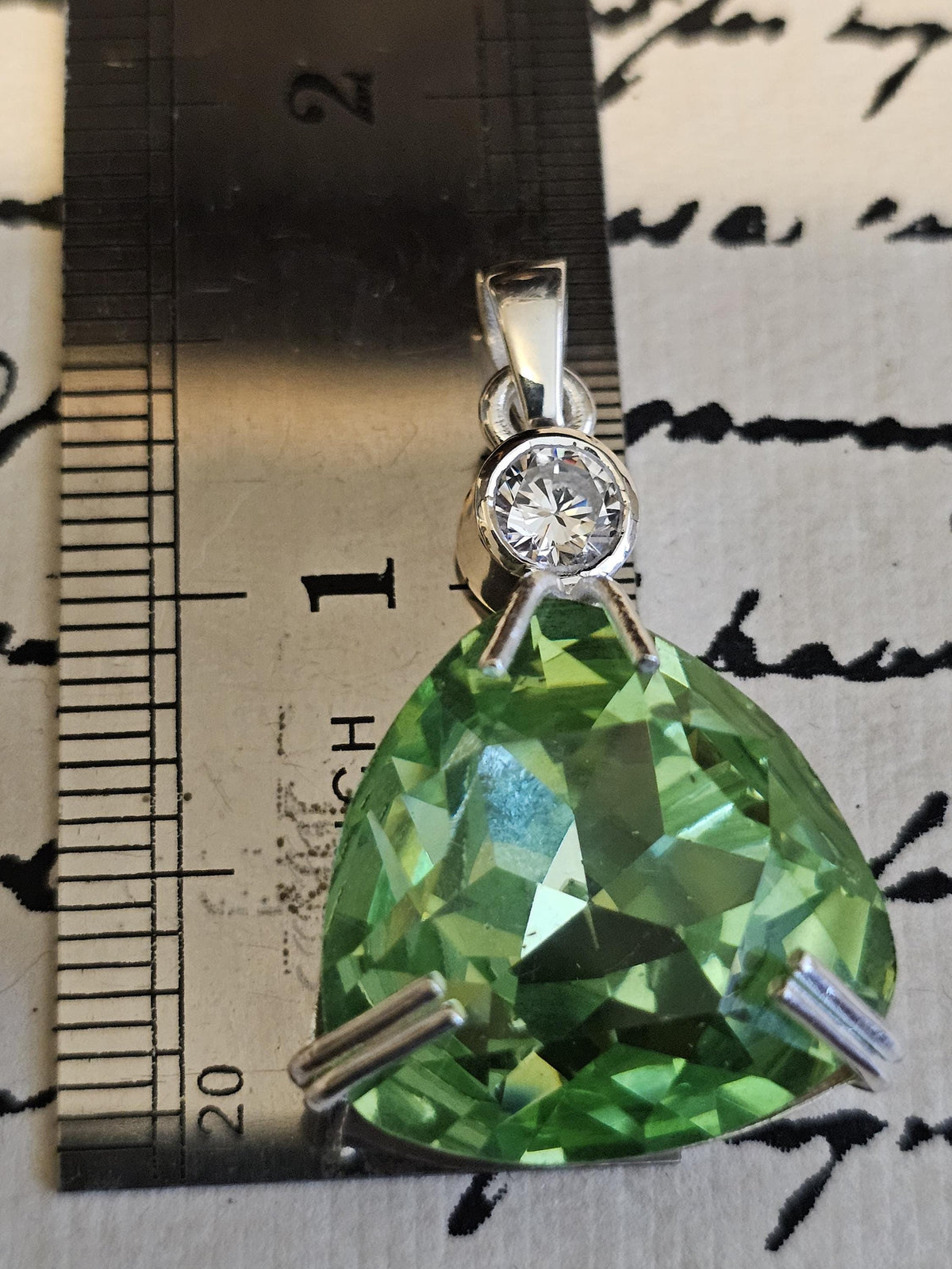 Uranium Glass Pendant in new Sterling Silver with a large 23 mm vintage Trillian cut Uranium Glass stone that glows under black / UV light