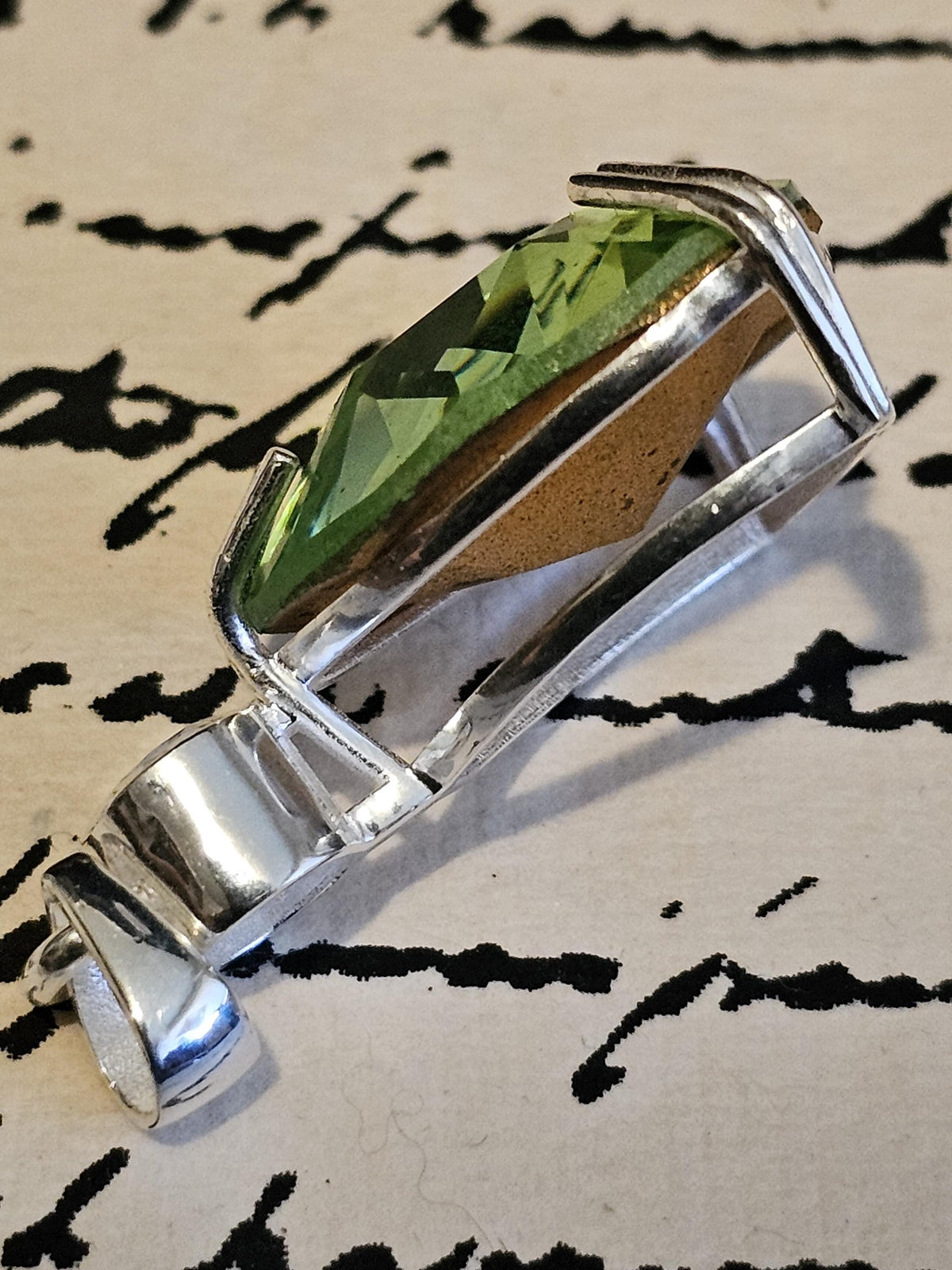 Uranium Glass Pendant in new Sterling Silver with a large 23 mm vintage Trillian cut Uranium Glass stone that glows under black / UV light