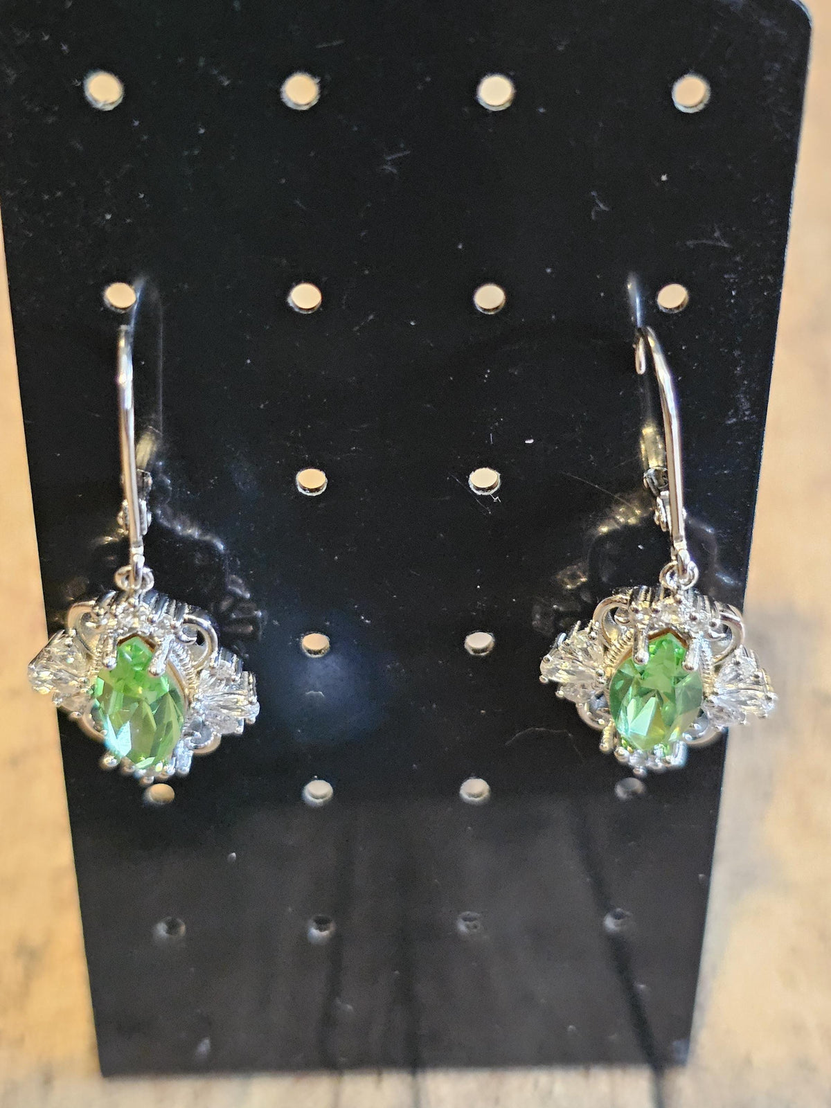 Uranium Glass Leverback Fleur De Lis Earrings Sterling Silver with Marquise cut 12x6 mm Uranium Glass stones, that glow under black/UV light