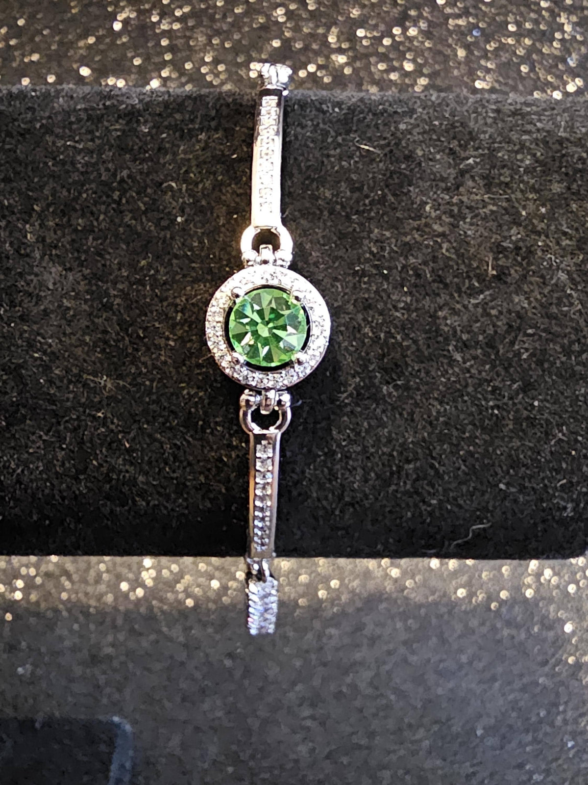 Uranium Glass Bracelet new Sterling Silver setting holding a vintage 6 mm Uranium glass Round cut stone that glows under black / UV light