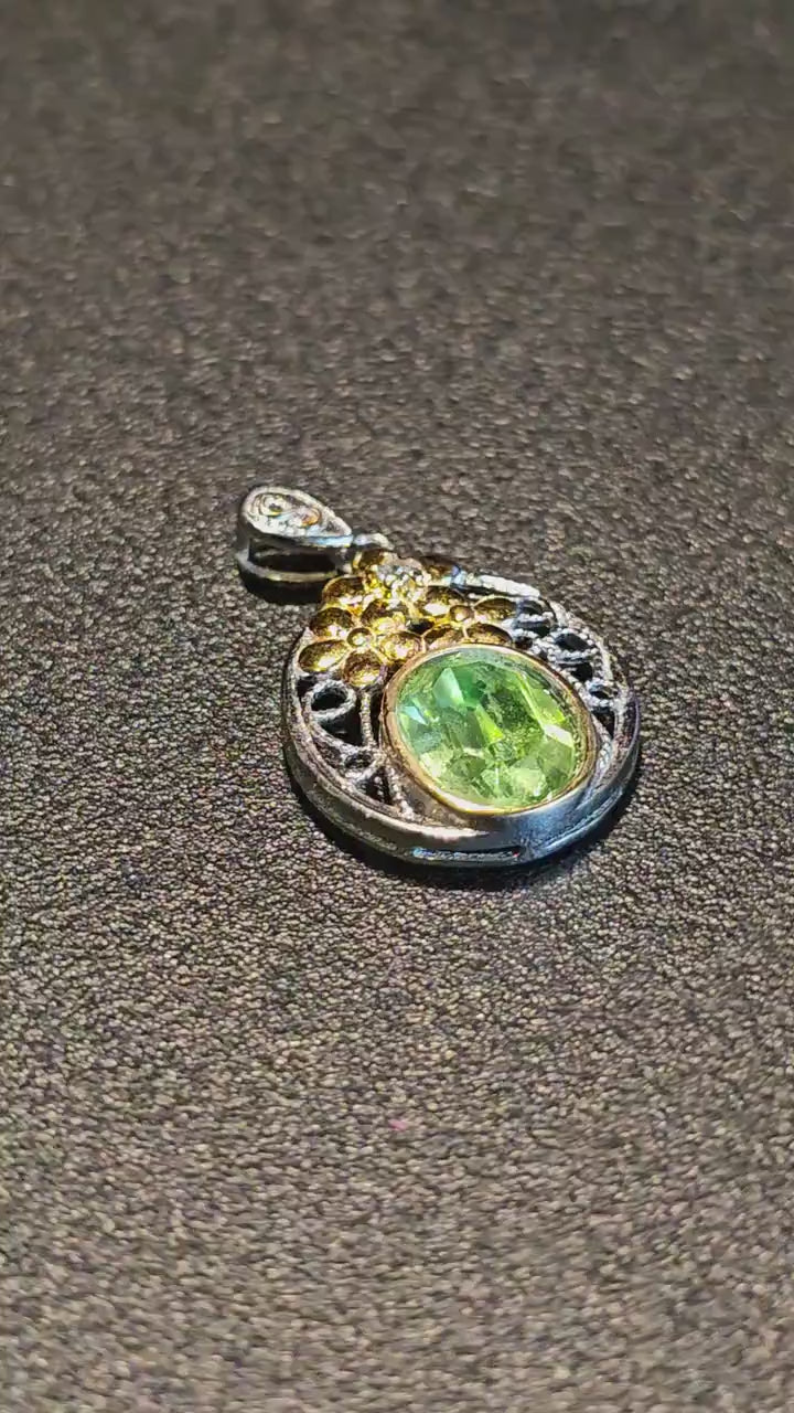 Uranium Glass Pendant in new Sterling Silver with a vintage Oval cut 10x8 mm Uranium Glass stone glows under black / UV light
