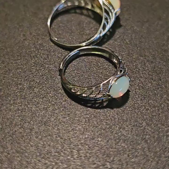 Uranium Glass Adjustable Ring  new Sterling Silver with vintage smooth top Opal colored Uranium glass Oval stone glows under black / UV ligh