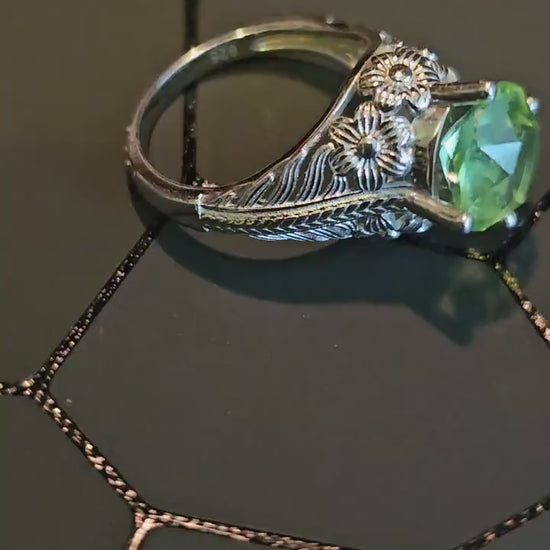 Uranium Glass Round cut Ring in size 7. Vintage style new Sterling Silver with a vintage Uranium glass stone that glows under black/UV light