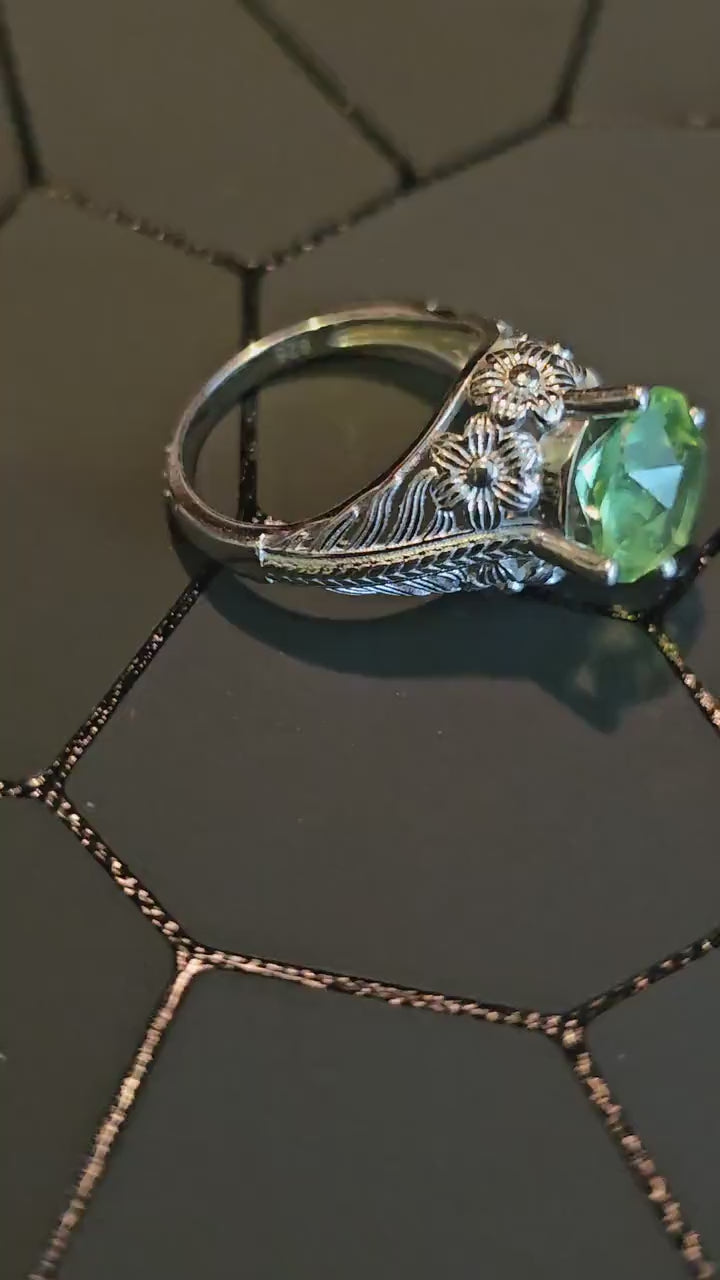 Uranium Glass Round cut Ring in size 7. Vintage style new Sterling Silver with a vintage Uranium glass stone that glows under black/UV light