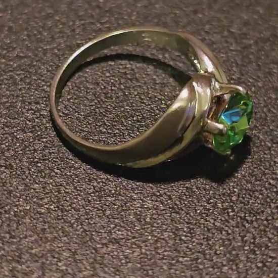 Uranium Glass Oval cut Ring size 7.5, new Sterling Silver with a vintage Uranium glass stone that glows under black / UV light