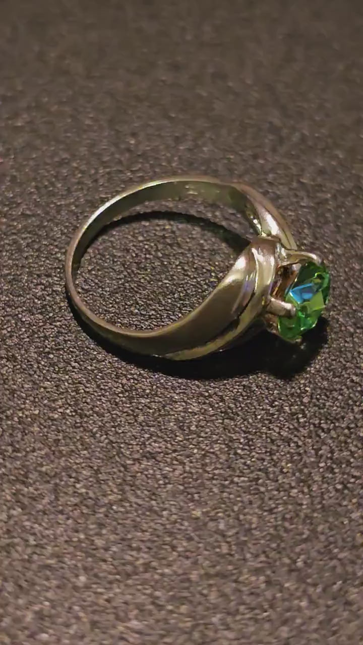 Uranium Glass Oval cut Ring size 7.5, new Sterling Silver with a vintage Uranium glass stone that glows under black / UV light