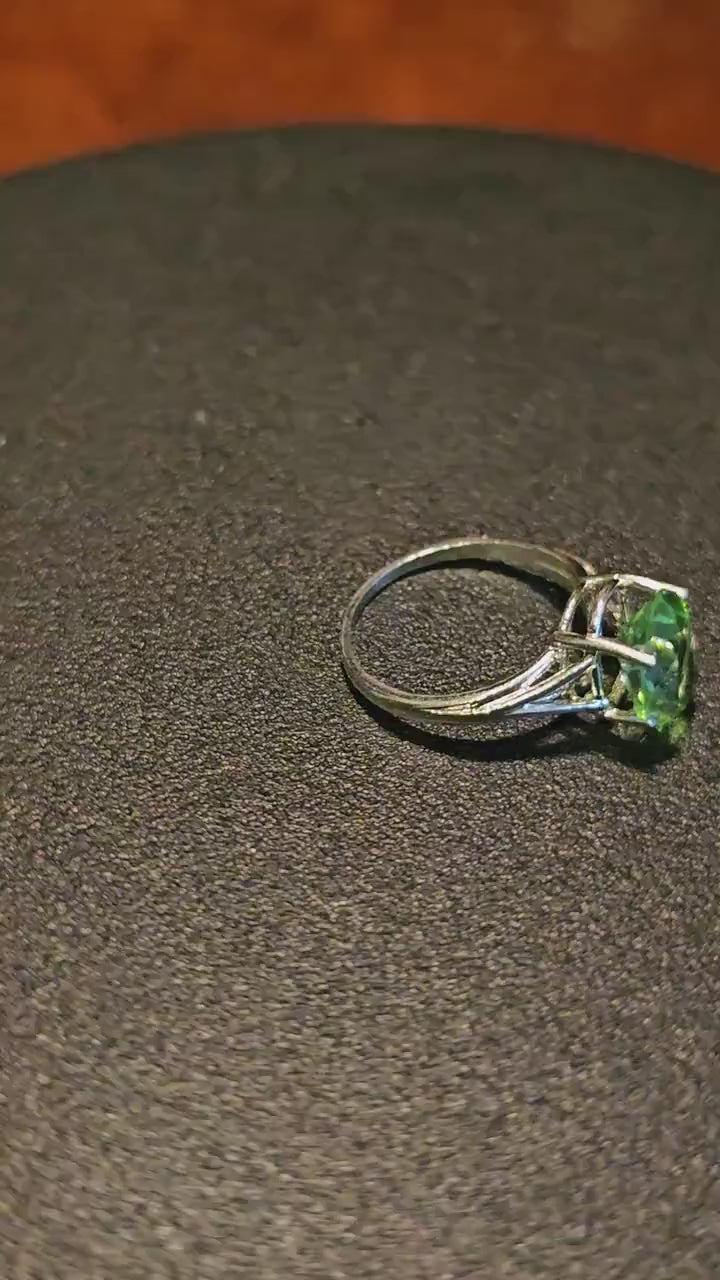 Uranium Glass Oval cut Ring size 5.5 split shank in new Sterling Silver with a 10x8 mm Uranium glass stone that glows under black / UV light