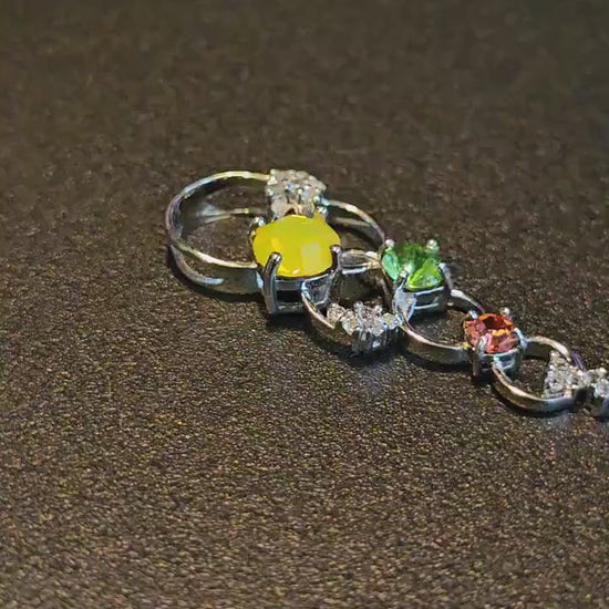 Uranium Glass Pendant in new Sterling Silver circle design with multiple vintage Uranium glass stones that glows under black / UV light