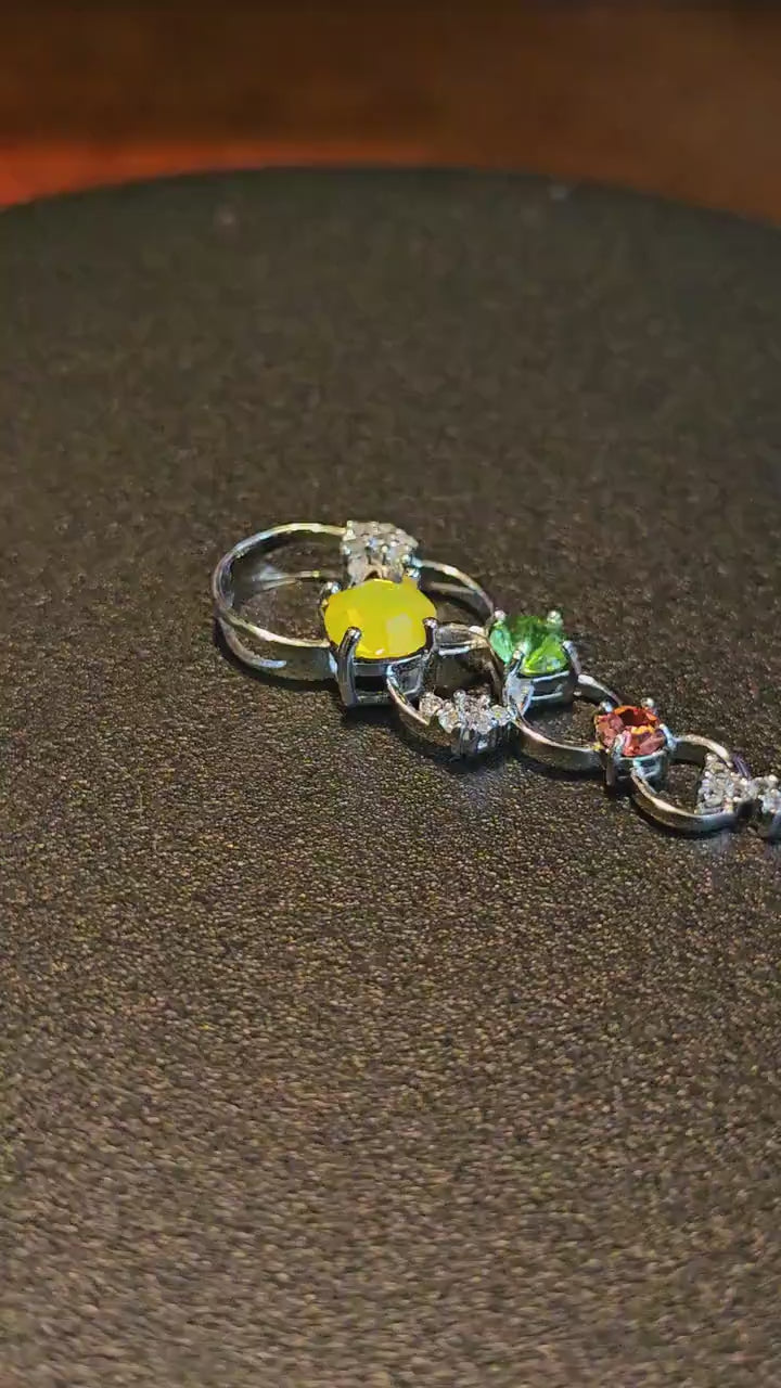 Uranium Glass Pendant in new Sterling Silver circle design with multiple vintage Uranium glass stones that glows under black / UV light