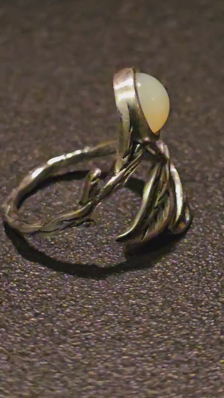 Uranium Glass Adjustable Ring in Sterling Silver Leaf and Branch design with vintage Uranium glass round stone glows under black / UV light