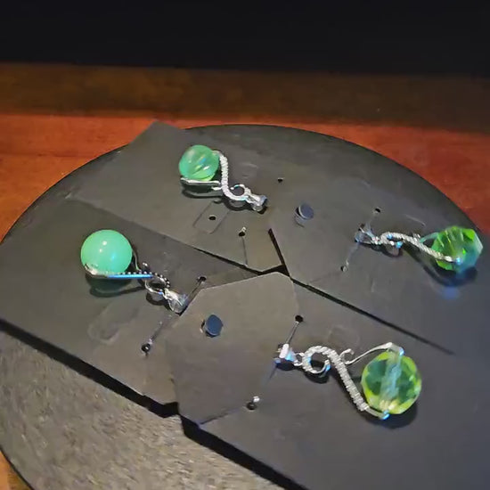 Uranium Glass Pendant in new Sterling Silver with a vintage 12 mm round Uranium Glass bead that glows under black / UV light