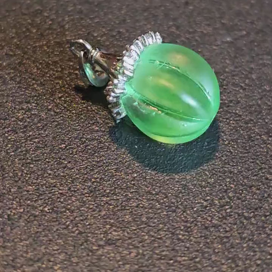 Uranium Glass Pendant in new Sterling Silver with a vintage 12 mm round Uranium Glass bead that glows under black / UV light