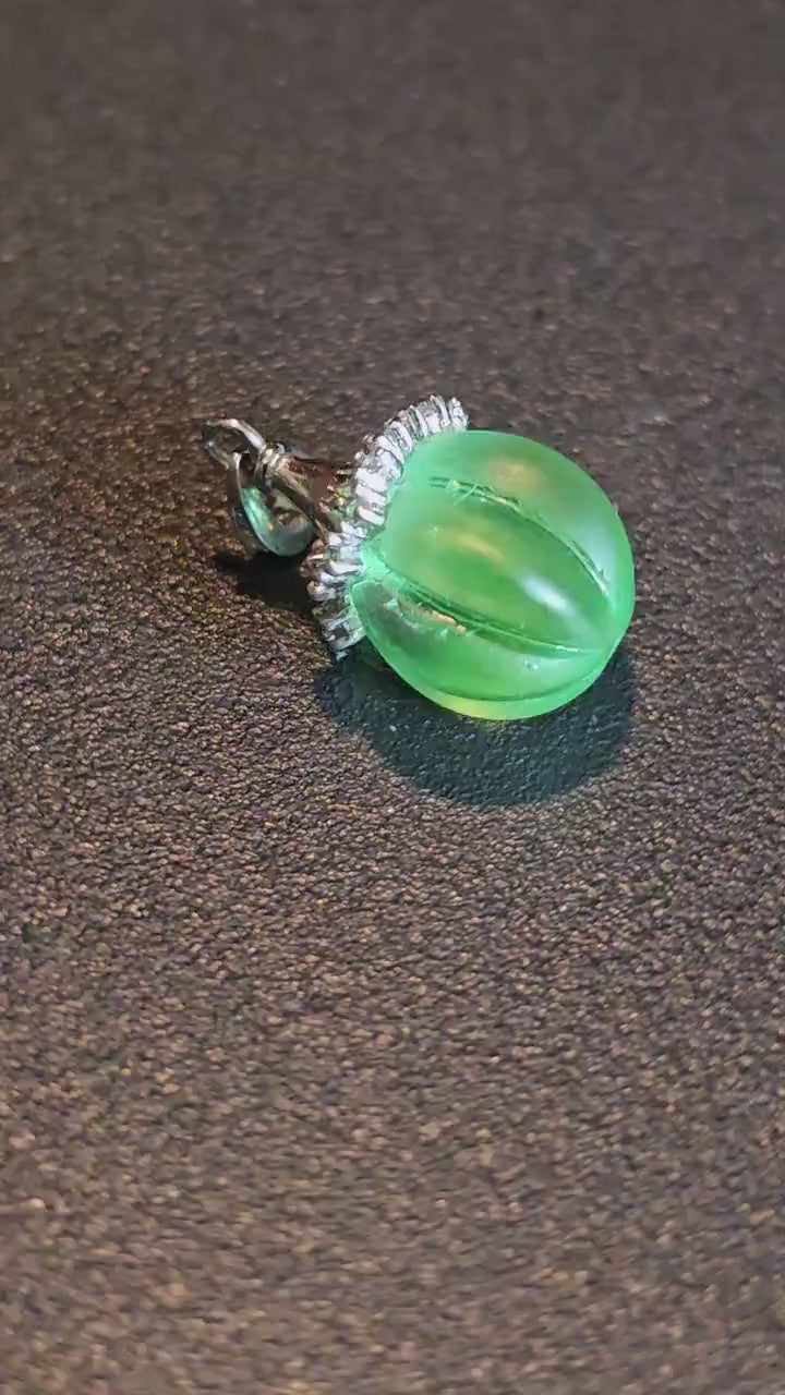 Uranium Glass Pendant in new Sterling Silver with a vintage 12 mm round Uranium Glass bead that glows under black / UV light
