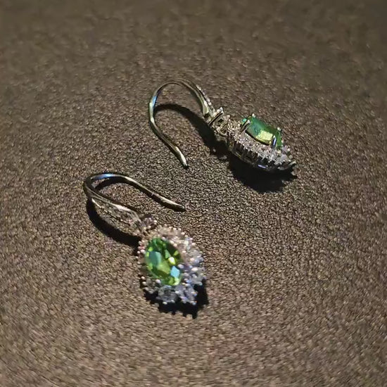 Uranium Glass Earrings in new Sterling Silver with Vintage5x7 mm Oval cut Uranium Glass stones that glow under black/UV light