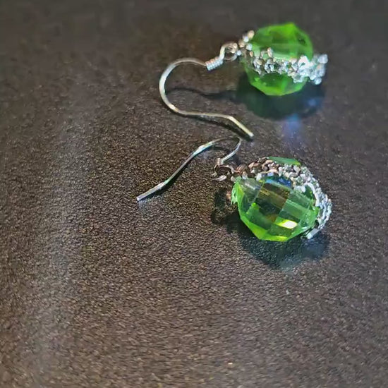 Uranium Glass Earrings with  large vintage 12mm round cut Uranium Glass beads in new Sterling Silver that glow under black / UV light