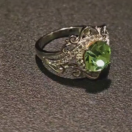 Uranium Glass Round cut Ring in size 6.5,  7 & 7.5 new Sterling Silver with  a vintage Uranium glass stone that glows under black / UV light