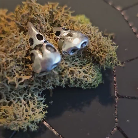 Uranium Glass Earrings Raven skull design with Sterling Silver posts. Vintage Round Uranium Glass Beads that glow under black/UV light