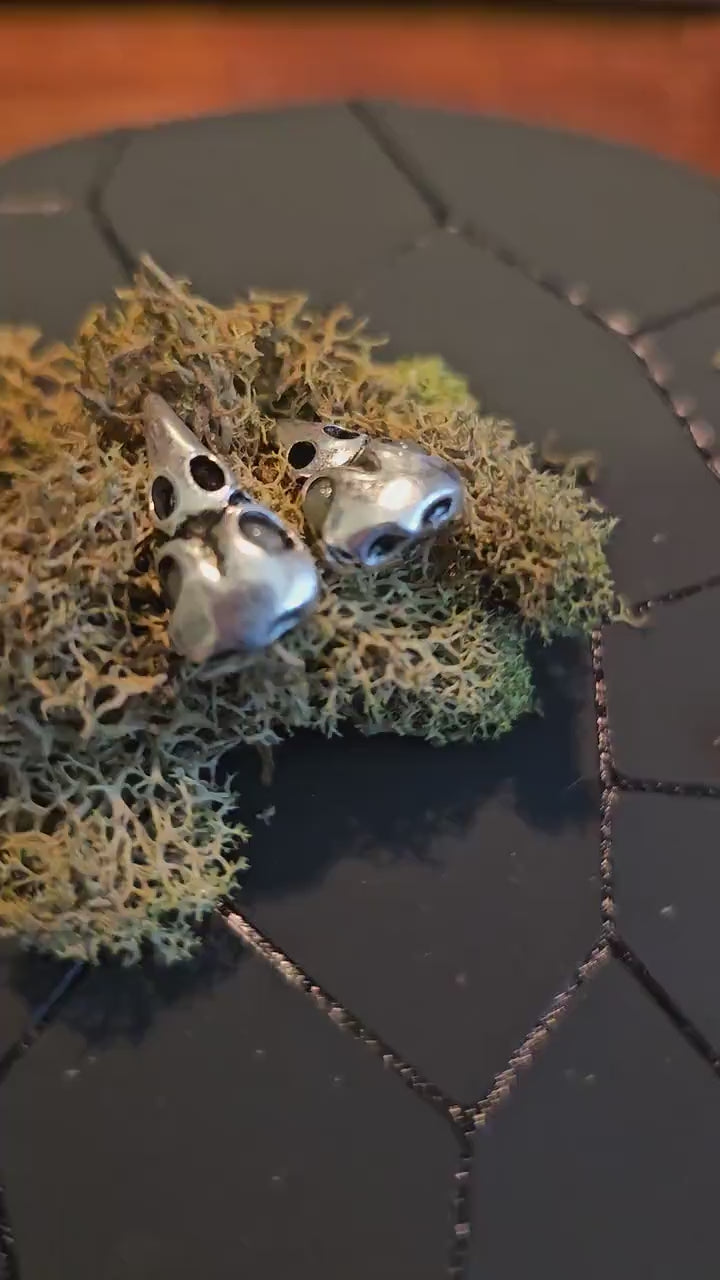 Uranium Glass Earrings Raven skull design with Sterling Silver posts. Vintage Round Uranium Glass Beads that glow under black/UV light