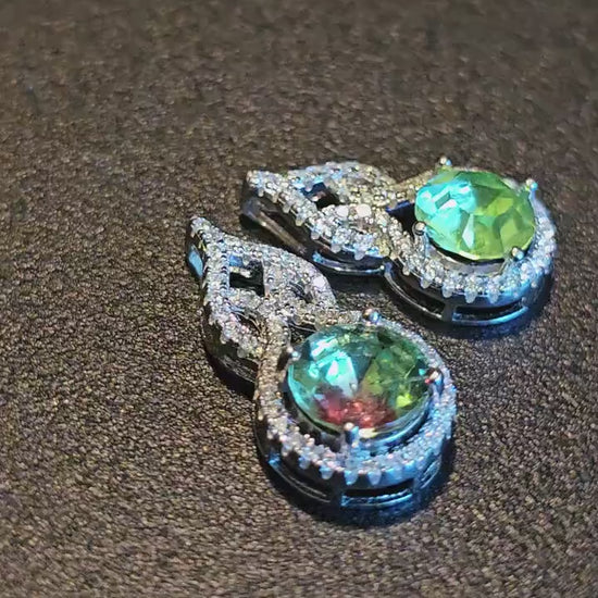 Uranium Glass Pendant in new Sterling Silver setting with a vintage 9 or 8mm round cut Uranium Glass stone that glows under black / UV light