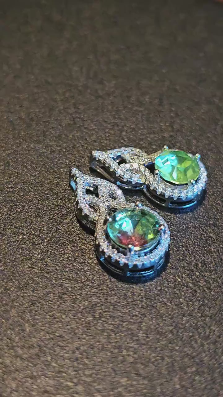 Uranium Glass Pendant in new Sterling Silver setting with a vintage 9 or 8mm round cut Uranium Glass stone that glows under black / UV light