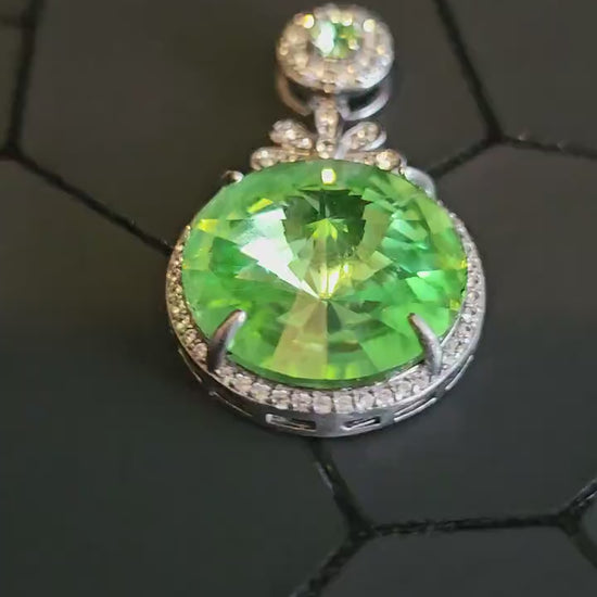 Uranium Glass Pendant new Sterling Silver with a vintage 18 mm Rivolis round cut Uranium Glass stone that glows under black / UV light