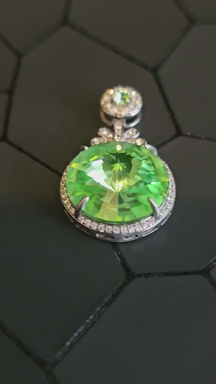 Uranium Glass Pendant new Sterling Silver with a vintage 18 mm Rivolis round cut Uranium Glass stone that glows under black / UV light