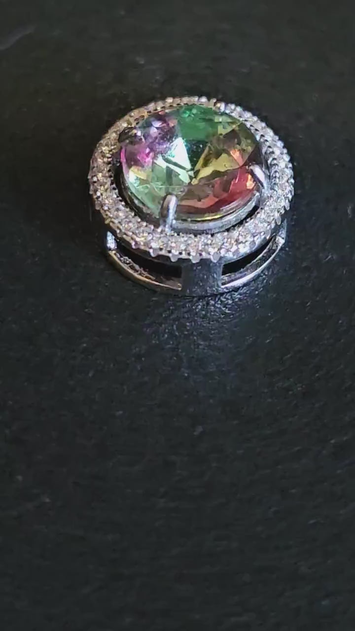 Uranium Glass Pendant in new Sterling Silver with a vintage 9 mm round cut Uranium Glass stone that glows under black / UV light