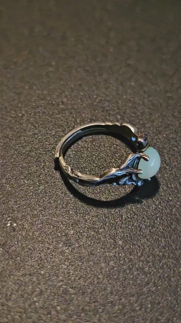 Uranium Glass Adjustable Ring in Sterling Silver Leaf and Branch design with vintage Uranium glass round stone glows under black / UV light