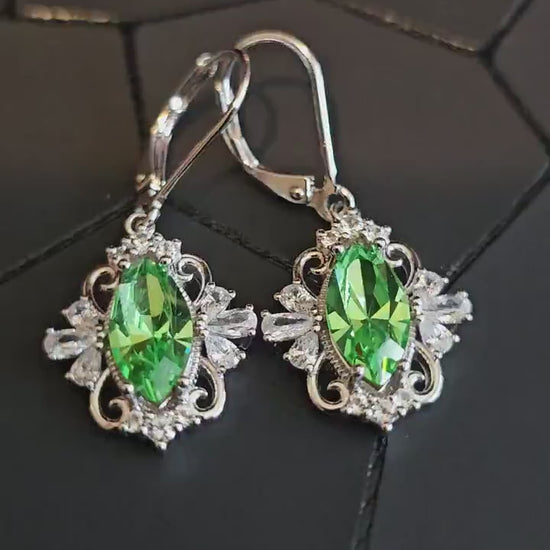 Uranium Glass Leverback Fleur De Lis Earrings Sterling Silver with Marquise cut 12x6 mm Uranium Glass stones, that glow under black/UV light