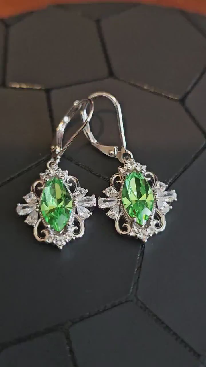 Uranium Glass Leverback Fleur De Lis Earrings Sterling Silver with Marquise cut 12x6 mm Uranium Glass stones, that glow under black/UV light