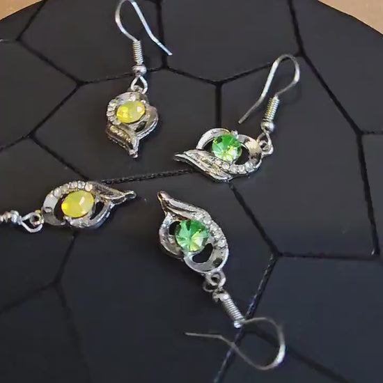 Uranium Glass Earrings new Silver plateing with Vintage Round cut 5 mm Uranium Glass stones Green or Yellow that glow under black/UV light