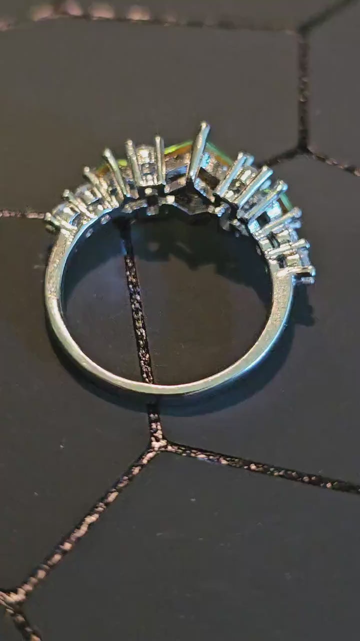Uranium Glass Ring Princess cut 8 accent stones and 3 vintage Uranium glass stones that glow under black/UV light. Sterling Silver size 7