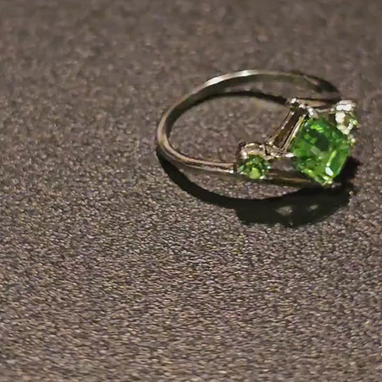 Uranium Glass Emerald cut Ring size 4 through 10.5 in new Sterling Silver with a vintage Uranium glass stone that glows under black / light