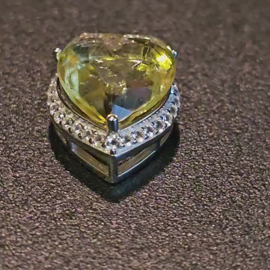 Uranium Glass Pendant in new Sterling Silver setting with a vintage 14 mm Heart cut Uranium Glass stone that glows under black / UV light