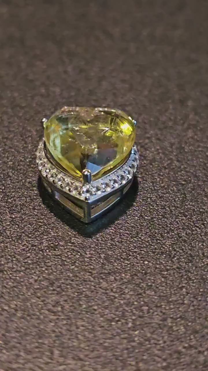 Uranium Glass Pendant in new Sterling Silver setting with a vintage 14 mm Heart cut Uranium Glass stone that glows under black / UV light