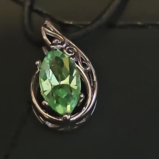 Uranium Glass Pendant in new Sterling Silver with a vintage 10x5 mm Marquee cut Uranium Glass stone that glows under black / UV light