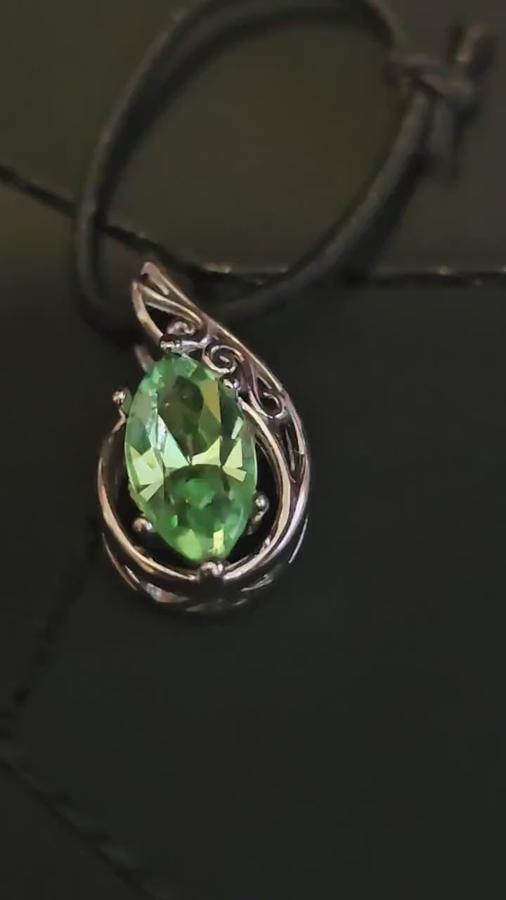 Uranium Glass Pendant in new Sterling Silver with a vintage 10x5 mm Marquee cut Uranium Glass stone that glows under black / UV light