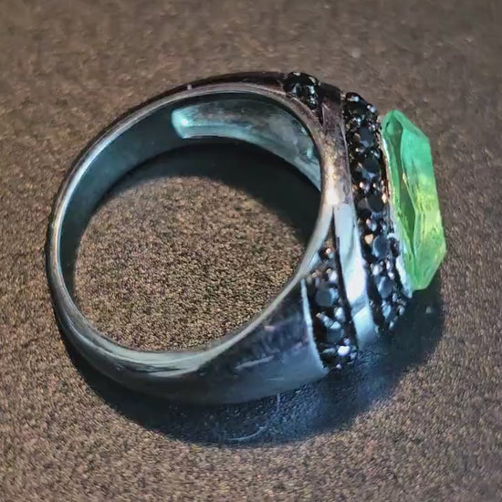 Uranium Glass Oval cut Ring  with black Spindle accent stones, and a vintage Uranium glass 12x8 mm  stone that glows under black / UV light