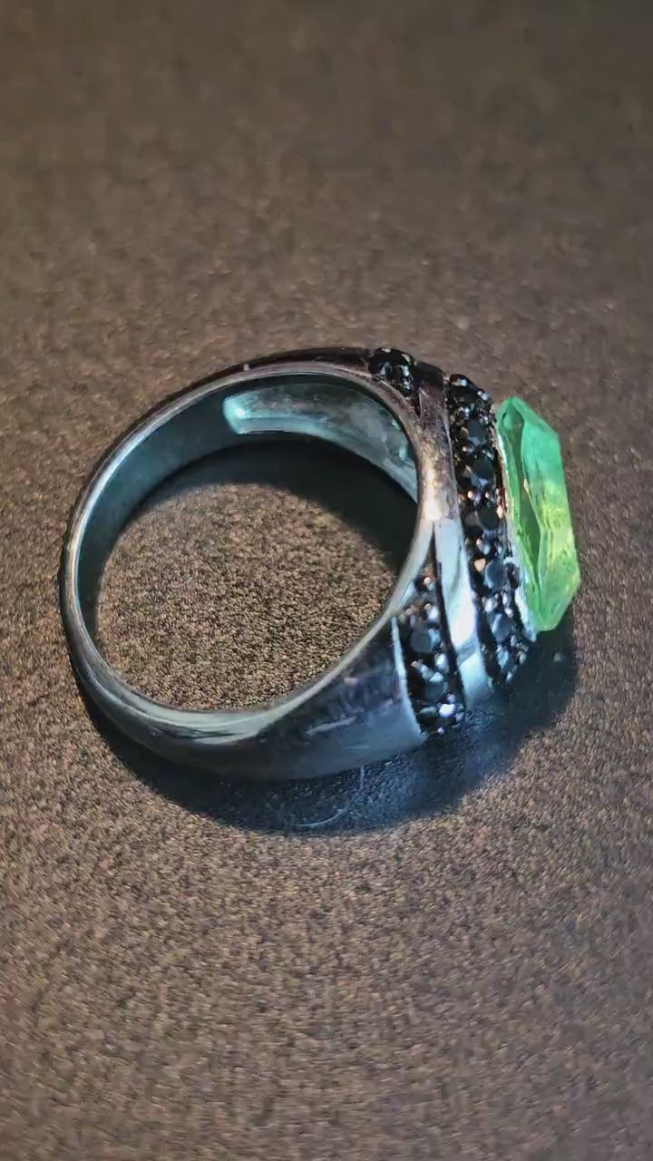 Uranium Glass Oval cut Ring  with black Spindle accent stones, and a vintage Uranium glass 12x8 mm  stone that glows under black / UV light