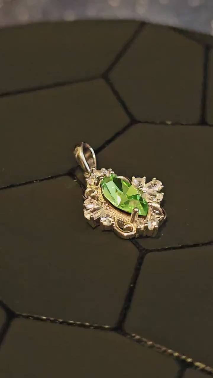 Uranium Glass Pendant in new Sterling Silver Fleur De Lis with a vintage 12x6 mm Marquise cut Uranium Glass that glows under black/UV light